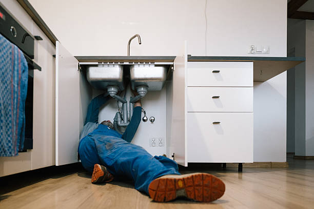 Professional Plumbing technician working in Montville, CT
